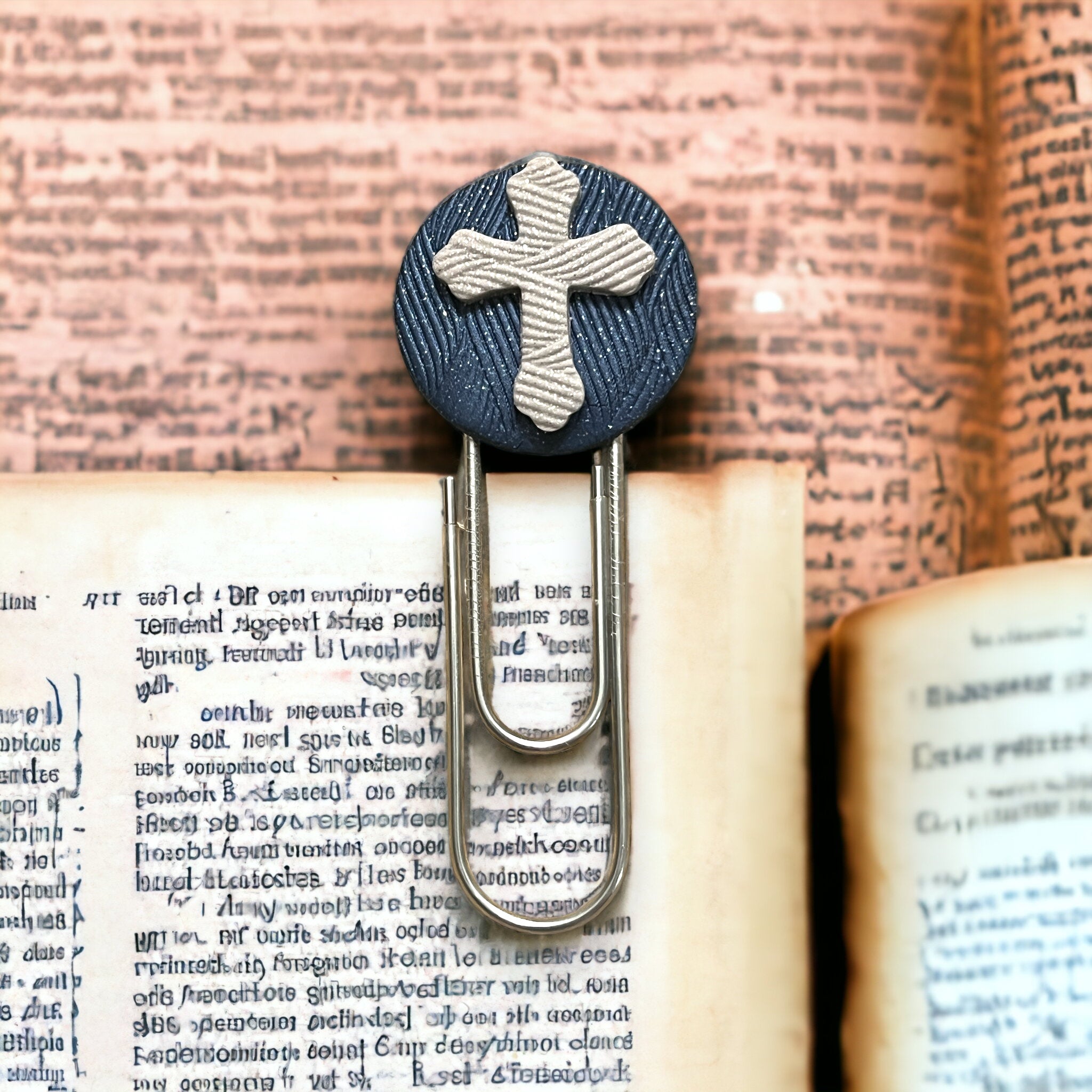 Blue and Grey Cross Paperclip Bookmark on page