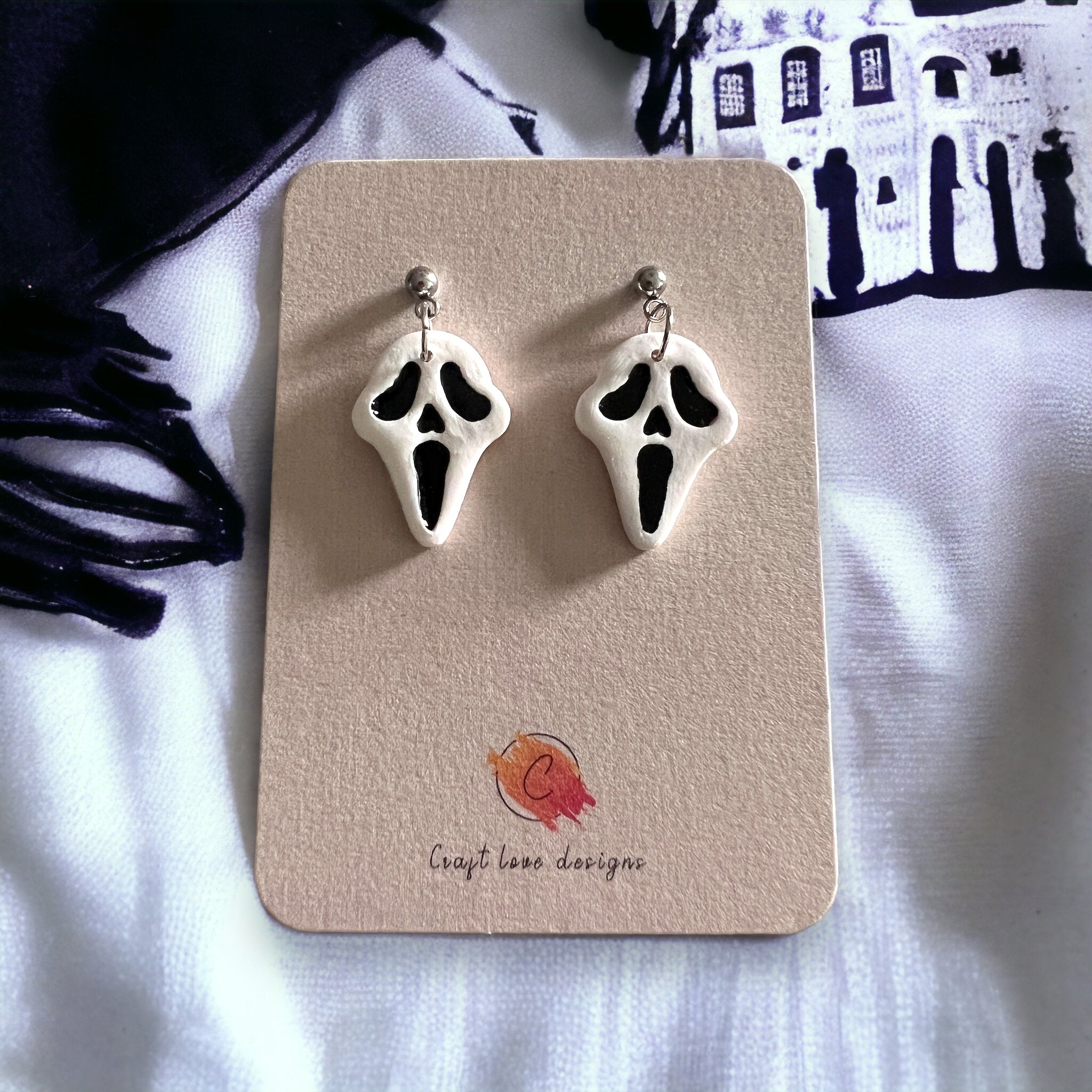 White and Black SPOOKY Face Dangle Earrings