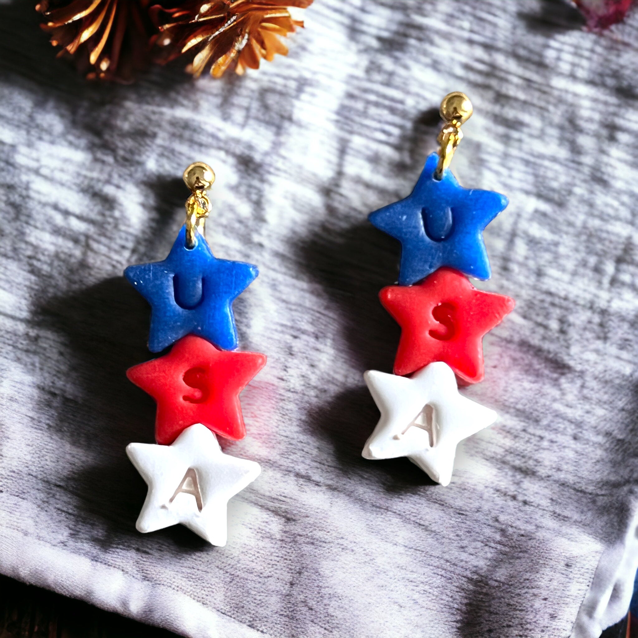 Handmade Fourth of July polymer clay earrings - vibrant and colorful.